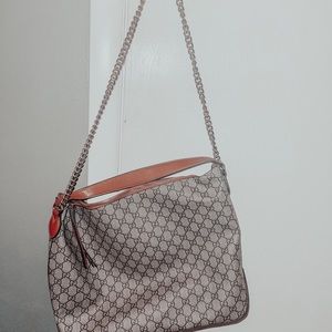 Gucci leather bag with chain shoulder strap. Brand new